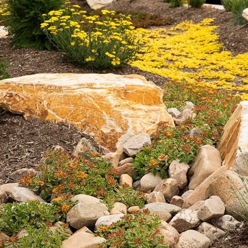We offer excavation services as well. A residential landscape design does not have to be an out-of-the-box landscape plan. Create texture, interest, and a bit of nature by landscaping with natural stone.
