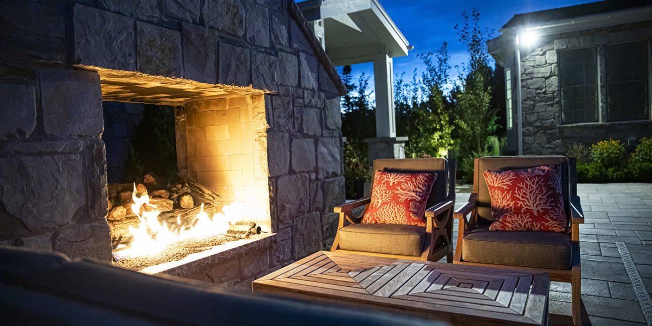 Gather around the fire of your very own outdoor fireplace. Create a unique hardscape design with an outdoor fireplace. Whether you choose to enclose the fireplace or create an open fire pit, design protective hardscape around the fire element for beauty and protection.