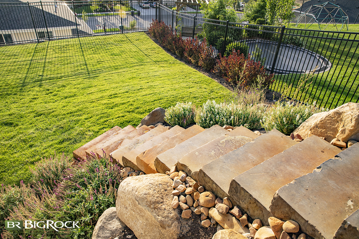 Create a custom landscape with the texture of natural stone. Hardscape landscape with stone is a great way to add interest to your landscape design.