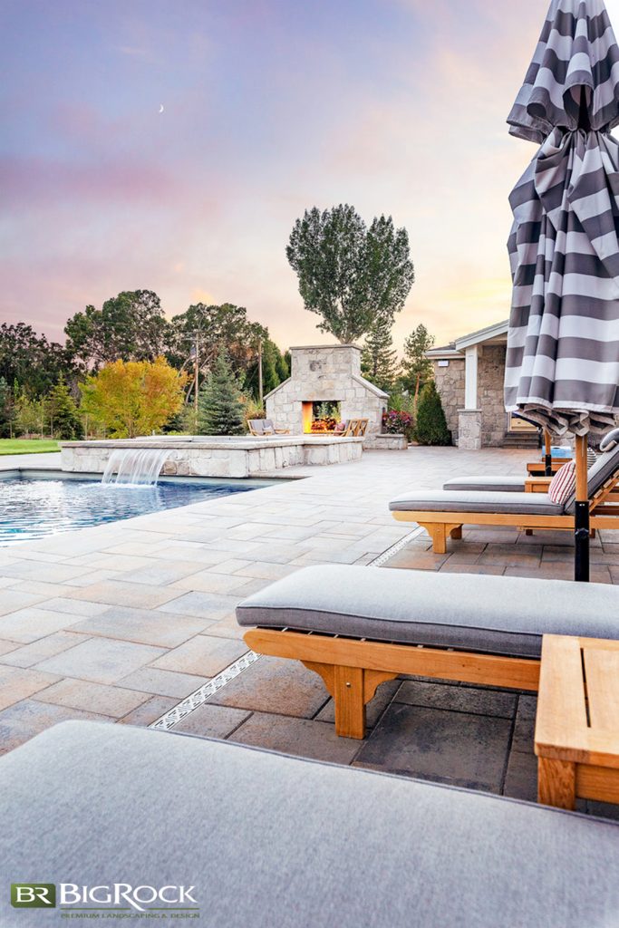 A luxury backyard landscaping design may include a perfectly placed water feature such as a water fountain or water fall in to your inground pool. Big Rock Landscaping can plan, design and install your luxury home landscaping.