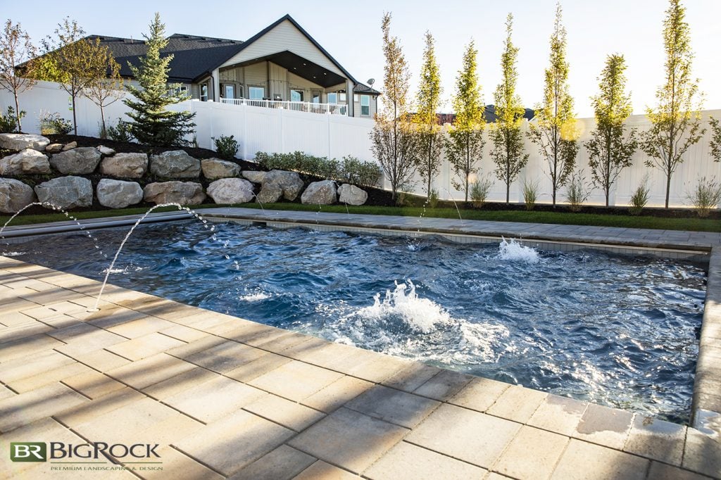 If your landscape design includes an inground pool, create a beautiful hardscape design to complete your pool. With the right cement, stone, or the perfectly chosen hardscape material, you can add beauty and texture to your backyard landscape and pool patio.