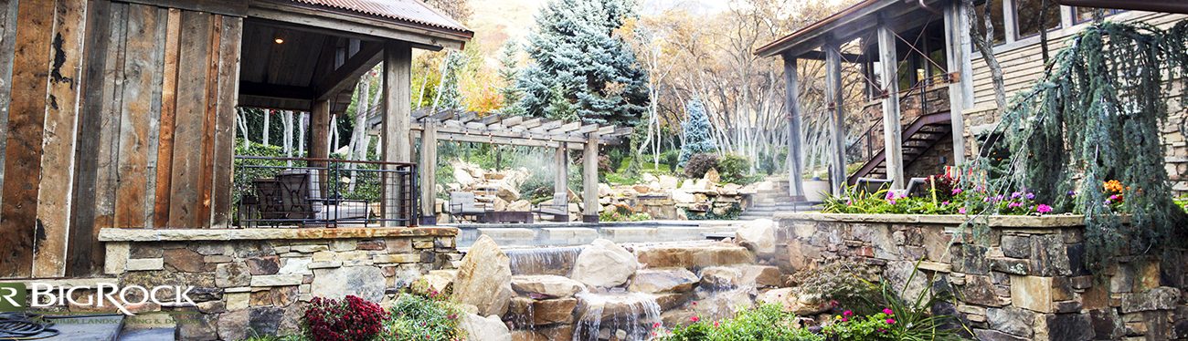 Landscaping walls don't have to be your landscape focal point. Blend retaining or garden bed walls with stonework or wood to match your landscaping design.