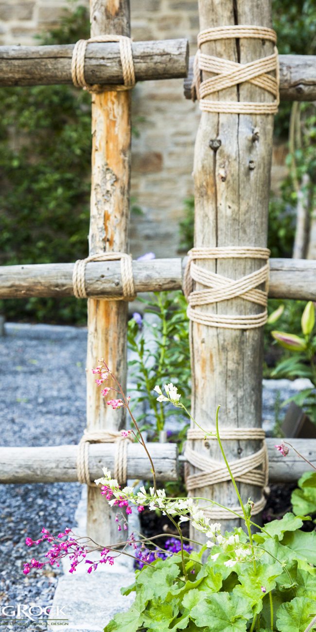 Unique ideas for rustic fencing made from wood. Create visual interest in landscaping with unique touches such as binding fence intersections with rope or twine.
