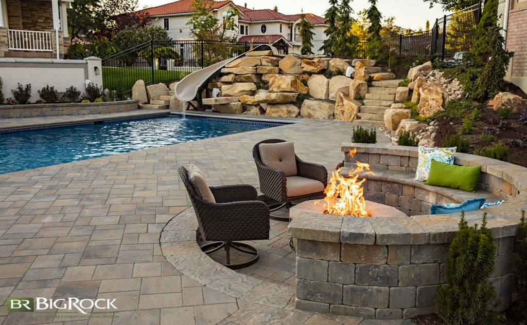 best backyard landscaping with round firepit