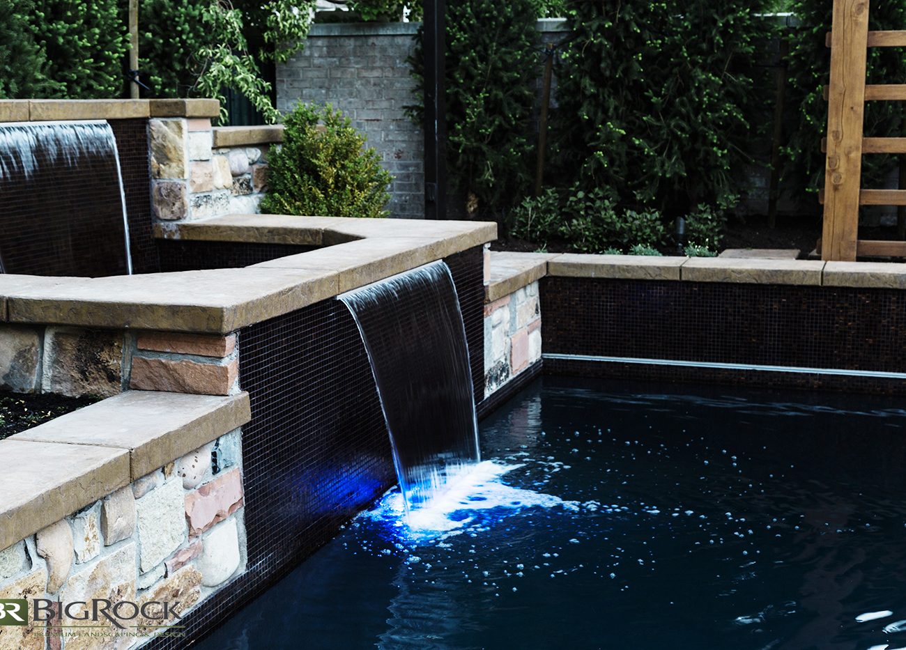 modern water fall design for luxury backyard pool