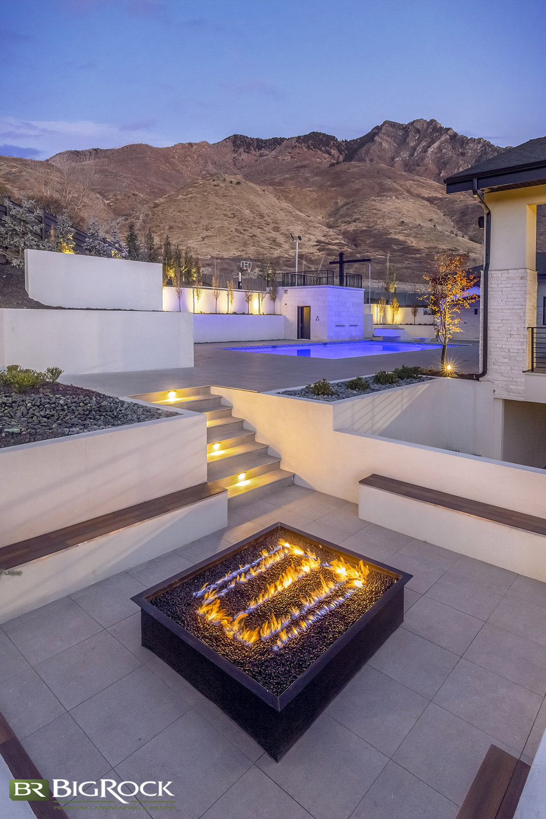Enjoy your outdoor fire pit all night long with the perfectly placed outdoor lighting for fire pit landscaping in your backyard.