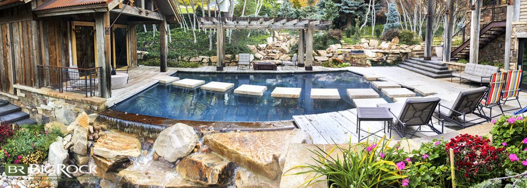 wood decking surrounding backyard pool