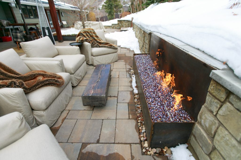 With the Colman project, we installed a custom outdoor fire feature that allows the owners to use the space year-round, an absolutely jaw-dropping result that gives them additional entertaining space in the cold months