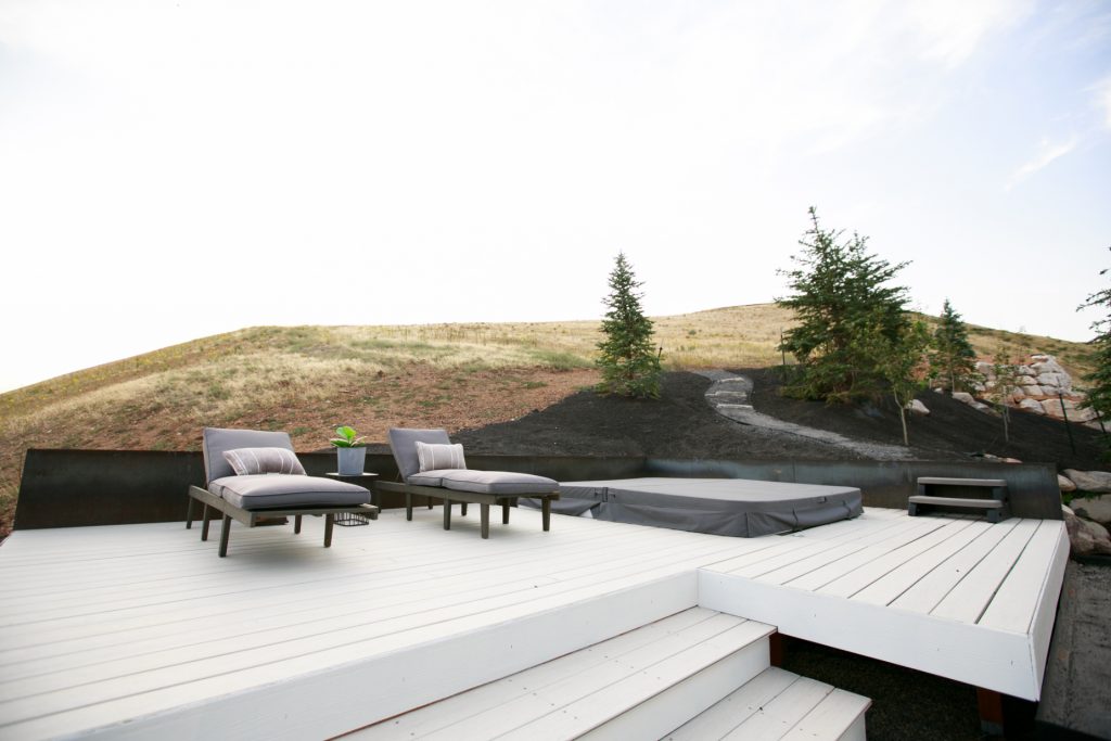 We added the hot tub at the top corner of the yard, giving it a little more privacy and stunning views of the valley below and the mountains behind.