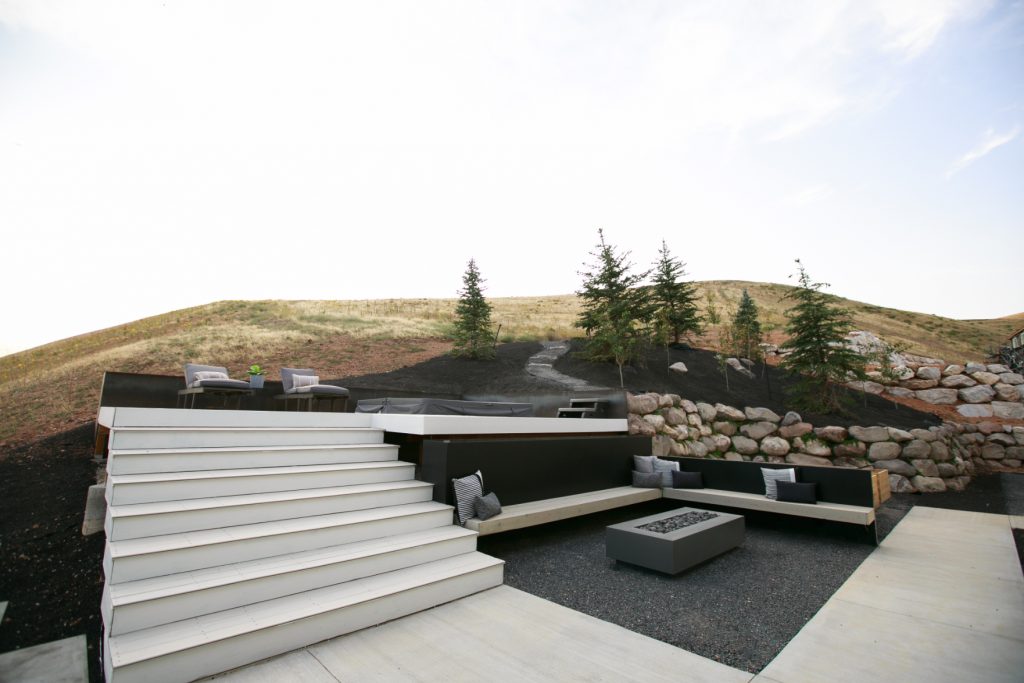 This is one of our favorite elements of the yard, with expansive views, the huge deck, and the fire pit just down the stairs from the hot tub