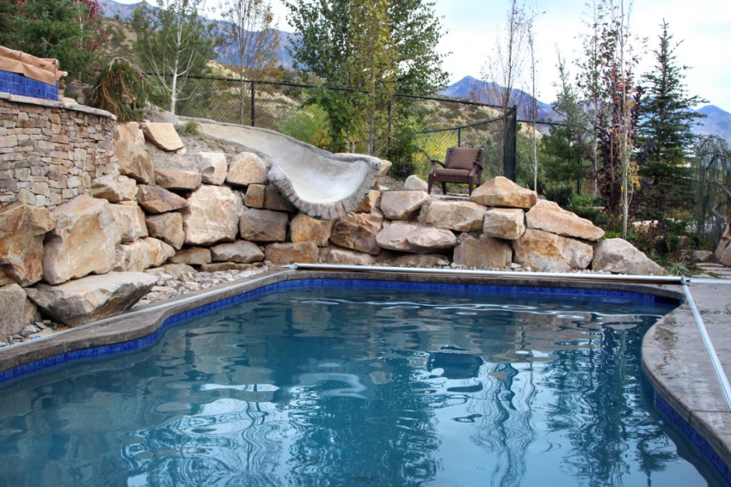 Whether it be a cascade of larger rocks with a gentle flow of water feeding through, or rocks that offer sizable surfaces for basking in the sun after a swim, the addition of rocks to your pool landscaping is sure to create a splash