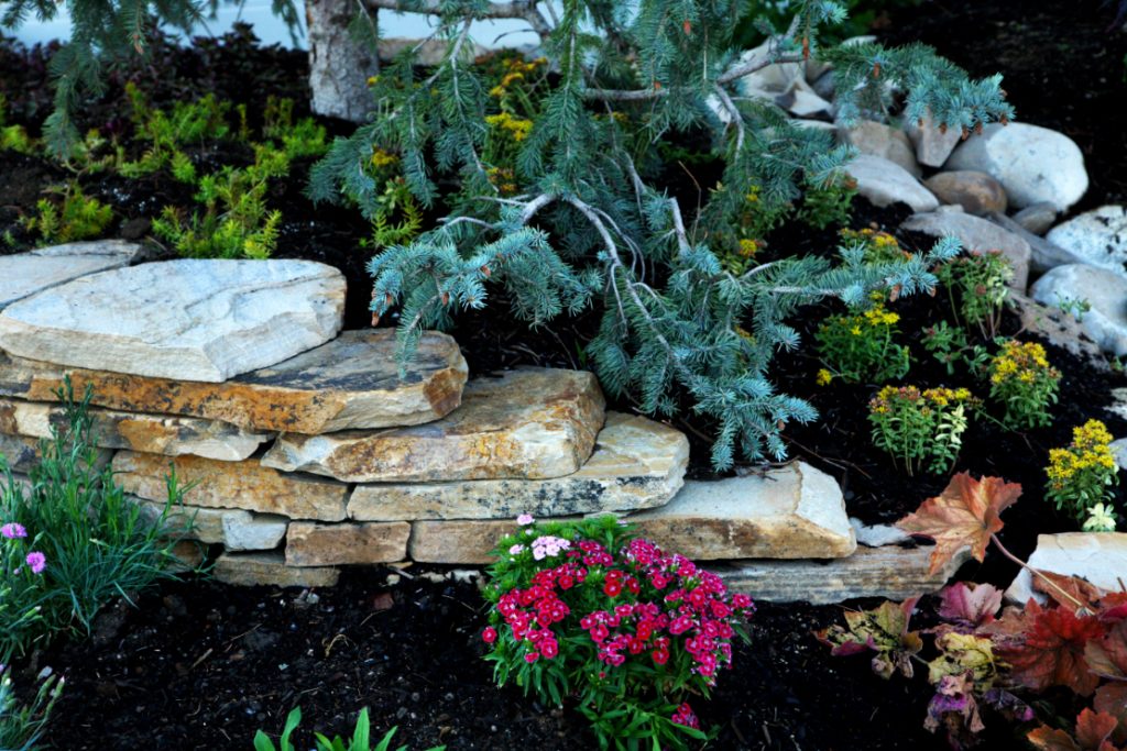 These stones are beautiful, and stacking them adds dimension while also supporting the levels in the garden