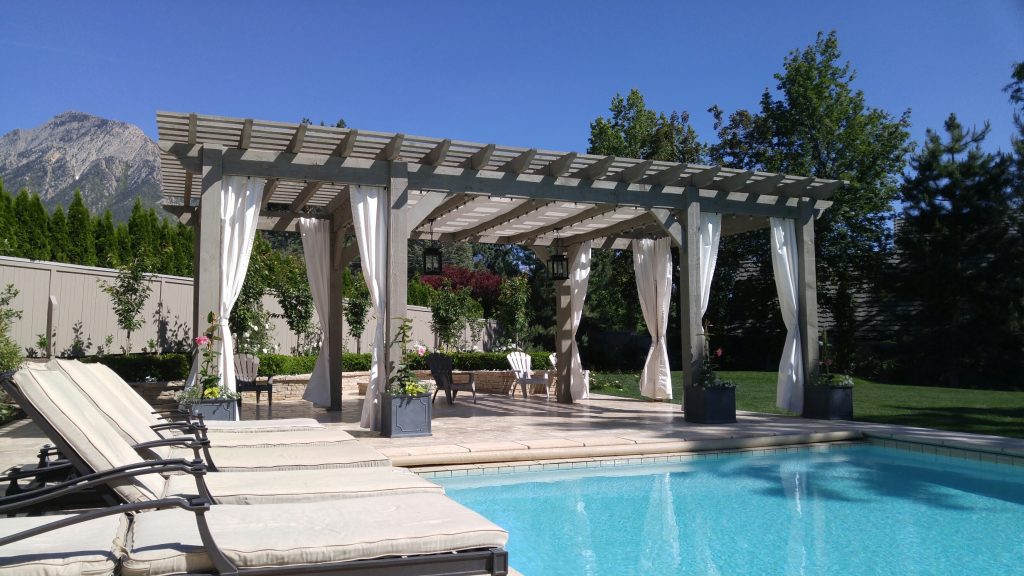 Sometimes you want a little extra shade, but you don’t want to completely block out the light with a fully covered patio. This is where pergolas shine