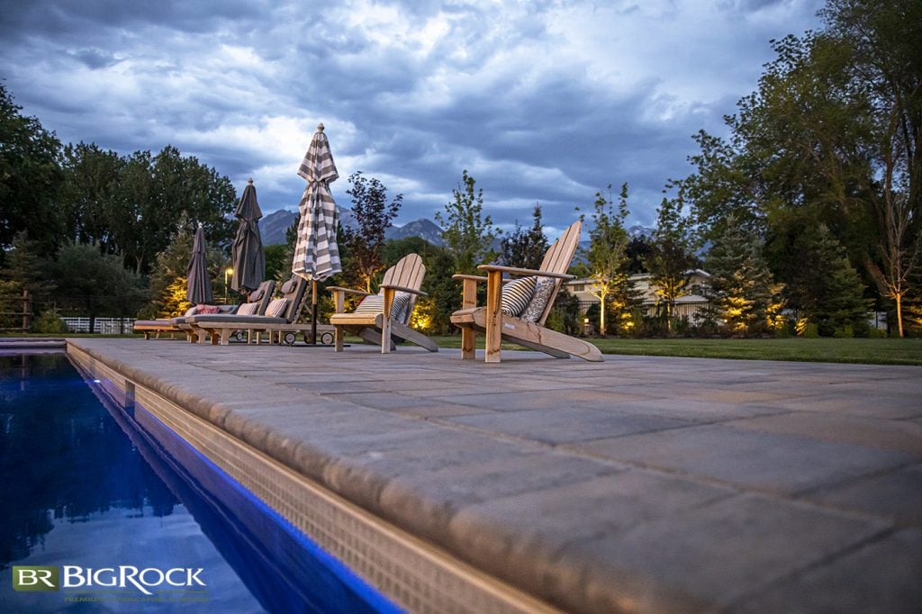 It’s always a good idea to provide ground and wall lighting alongside pools and other water features