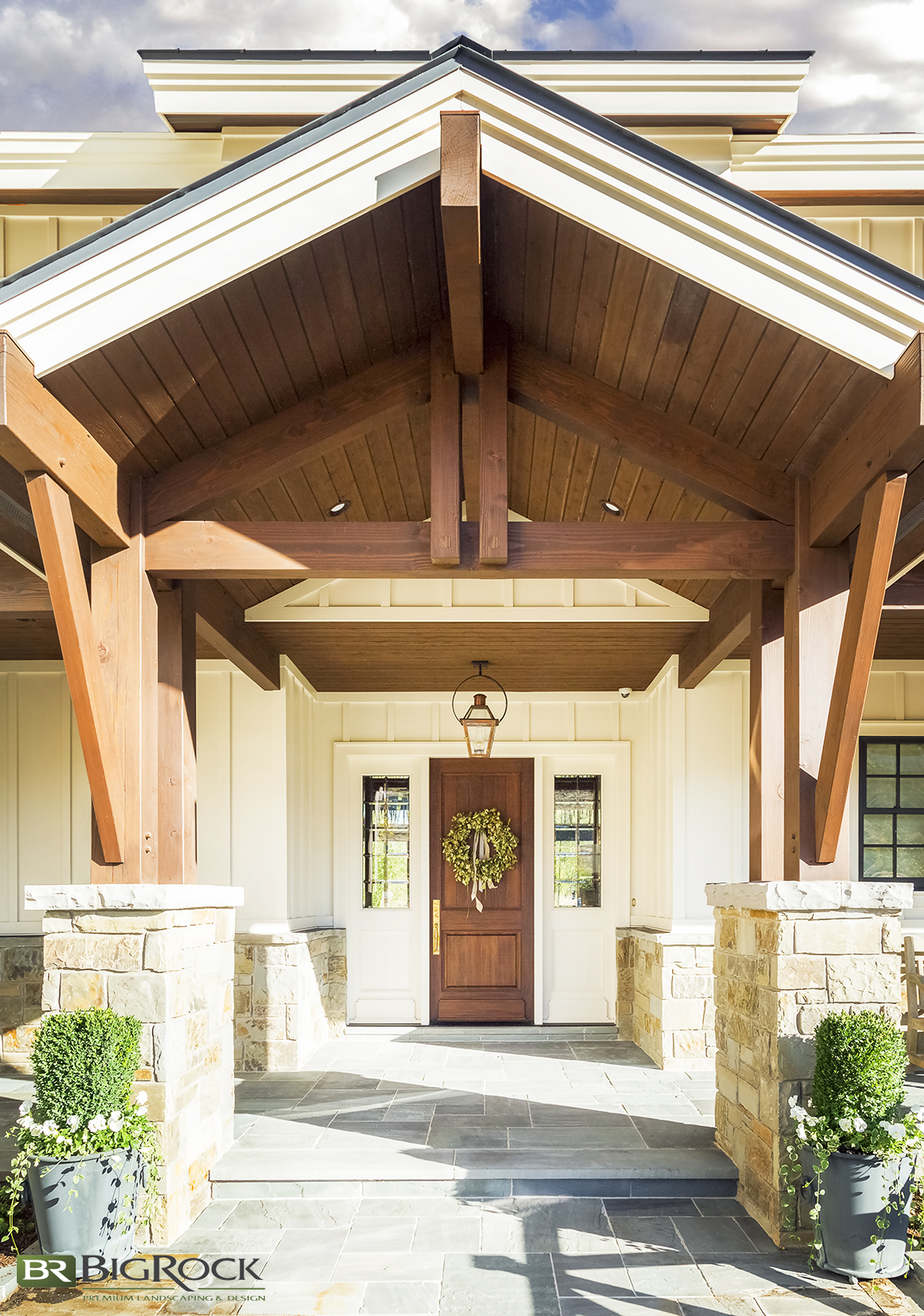Enhance your large and spacious home entryways with landscaping shrubs and designs that complete your architecture.