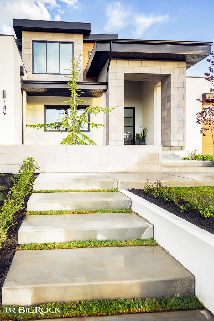 This home does a phenomenal job of breaking up the concrete curbing into specialized spaces.