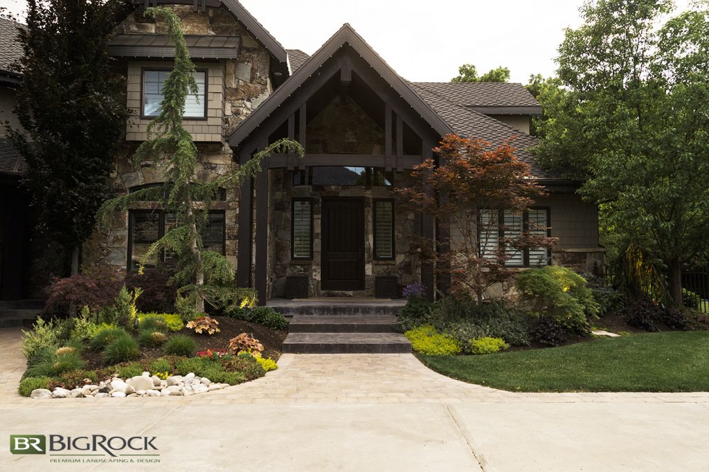 In this home, we love how the mature landscaping is literally hugging every corner of this rustic home.