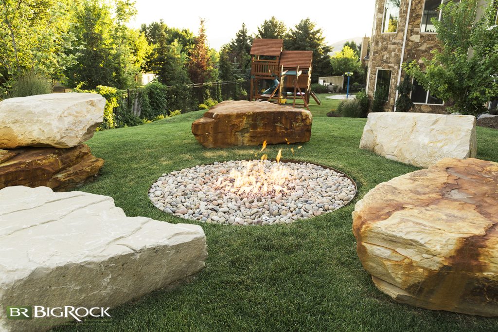 Boulders are a practical, yet lovely way to provide extra seating around the fire pit