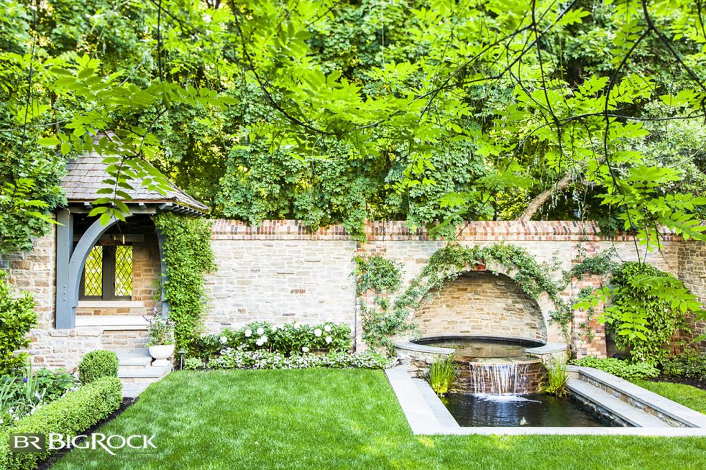 In any good English landscape design, you will have a pleasing combination of structure and borders amongst many organic elements that soften the harsh lines of buildings or other man-made structures