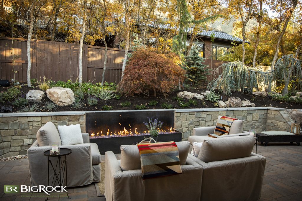 Sitting around this fire might lead you to ask yourself whether you’re in a backyard or up in the mountains.