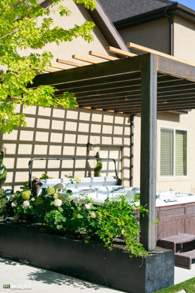 You can make any space feel like home and meet (most of) your needs. This small yard space uses a pergola perfectly to enhance the aesthetic of the small yard.