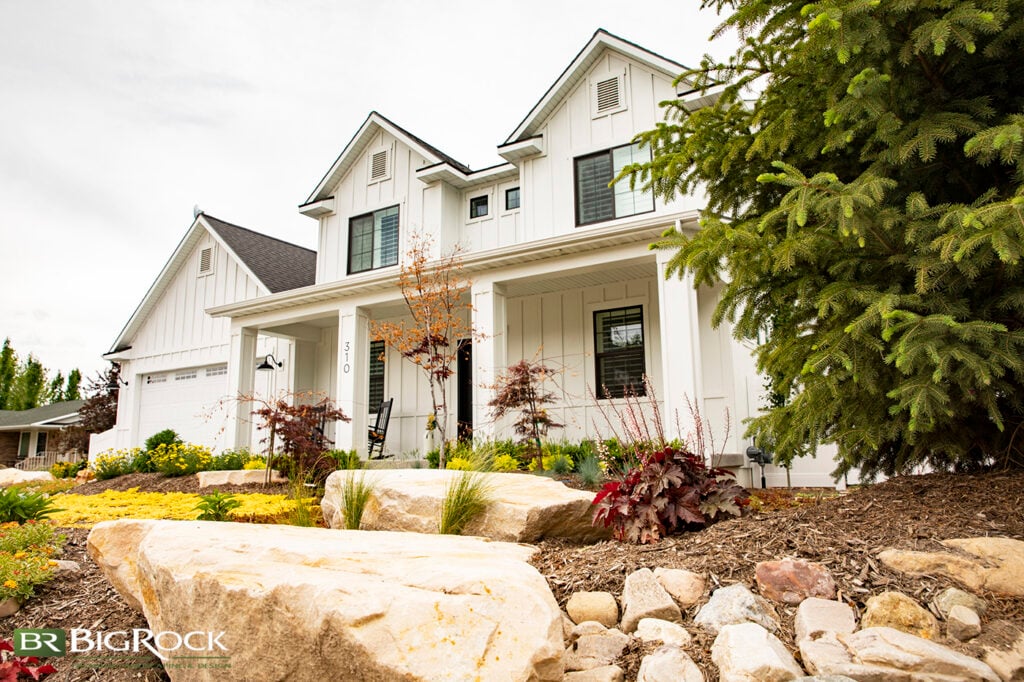 By adding a boulder rock wall, you are creating a visual interest that will break up the space and create new focal points. This is also a good way to create different and new spaces in your yard whether it be with new seating or entertaining areas or even an area that will showcase a water feature.
